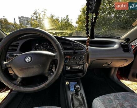 Красный Дэу Ланос, объемом двигателя 1.5 л и пробегом 326 тыс. км за 3100 $, фото 15 на Automoto.ua
