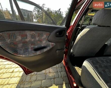 Красный Дэу Ланос, объемом двигателя 1.5 л и пробегом 326 тыс. км за 3100 $, фото 19 на Automoto.ua