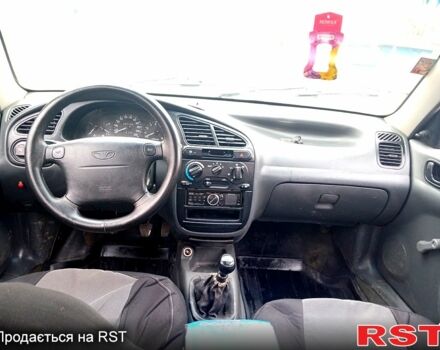 Червоний Деу Ланос, об'ємом двигуна 1.5 л та пробігом 303 тис. км за 1550 $, фото 7 на Automoto.ua