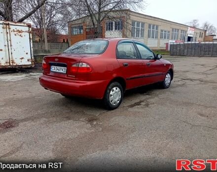 Червоний Деу Ланос, об'ємом двигуна 1.5 л та пробігом 303 тис. км за 1550 $, фото 3 на Automoto.ua