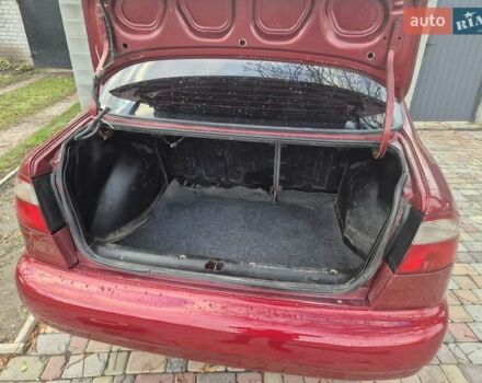 Червоний Деу Ланос, об'ємом двигуна 1.5 л та пробігом 313 тис. км за 2200 $, фото 11 на Automoto.ua