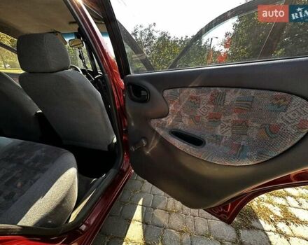 Красный Дэу Ланос, объемом двигателя 1.5 л и пробегом 326 тыс. км за 3100 $, фото 20 на Automoto.ua