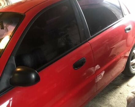 Красный Дэу Ланос, объемом двигателя 1.6 л и пробегом 251 тыс. км за 2300 $, фото 7 на Automoto.ua