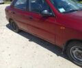 Красный Дэу Ланос, объемом двигателя 1.5 л и пробегом 140 тыс. км за 750 $, фото 3 на Automoto.ua