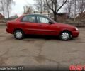 Червоний Деу Ланос, об'ємом двигуна 1.5 л та пробігом 303 тис. км за 1550 $, фото 5 на Automoto.ua