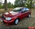 Красный Дэу Ланос, объемом двигателя 1.5 л и пробегом 213 тыс. км за 2599 $, фото 1 на Automoto.ua