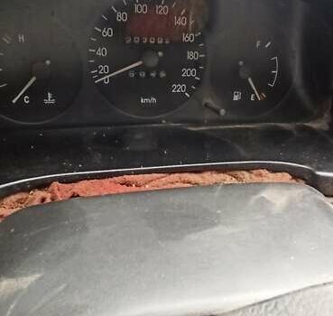 Красный Дэу Ланос, объемом двигателя 1.5 л и пробегом 150 тыс. км за 1000 $, фото 6 на Automoto.ua