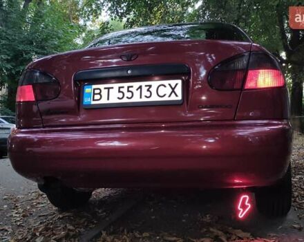 Красный Дэу Ланос, объемом двигателя 1.5 л и пробегом 275 тыс. км за 3300 $, фото 27 на Automoto.ua