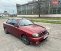 Красный Дэу Ланос, объемом двигателя 1.5 л и пробегом 264 тыс. км за 1600 $, фото 1 на Automoto.ua