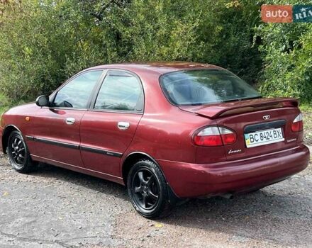 Червоний Деу Ланос, об'ємом двигуна 1.6 л та пробігом 277 тис. км за 1750 $, фото 5 на Automoto.ua