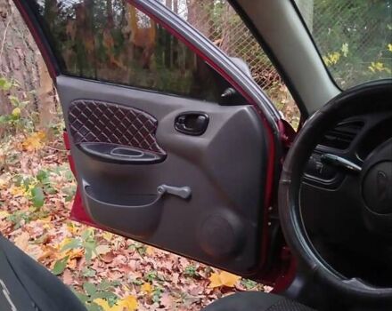 Красный Дэу Ланос, объемом двигателя 1.5 л и пробегом 174 тыс. км за 1750 $, фото 7 на Automoto.ua