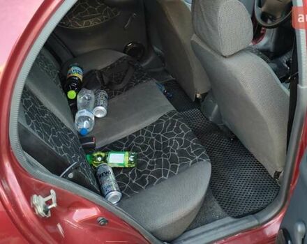 Красный Дэу Ланос, объемом двигателя 1.5 л и пробегом 275 тыс. км за 3300 $, фото 16 на Automoto.ua