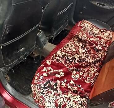 Красный Дэу Ланос, объемом двигателя 1.5 л и пробегом 150 тыс. км за 1000 $, фото 7 на Automoto.ua