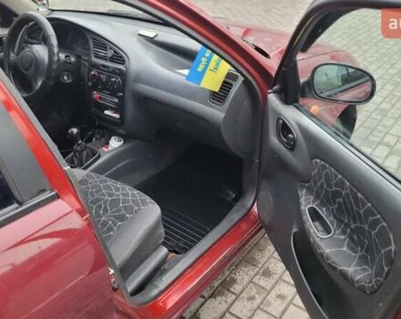 Красный Дэу Ланос, объемом двигателя 1.5 л и пробегом 283 тыс. км за 2800 $, фото 4 на Automoto.ua