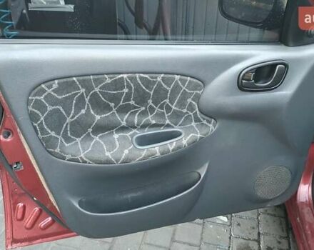 Красный Дэу Ланос, объемом двигателя 1.5 л и пробегом 275 тыс. км за 3300 $, фото 17 на Automoto.ua