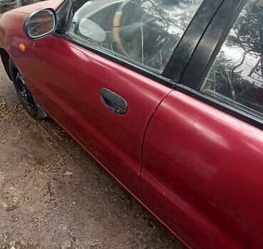 Красный Дэу Ланос, объемом двигателя 1.5 л и пробегом 150 тыс. км за 1000 $, фото 8 на Automoto.ua