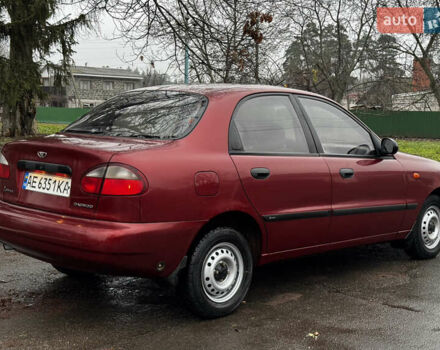 Красный Дэу Ланос, объемом двигателя 1.5 л и пробегом 139 тыс. км за 2600 $, фото 2 на Automoto.ua