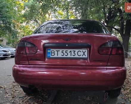 Красный Дэу Ланос, объемом двигателя 1.5 л и пробегом 275 тыс. км за 3300 $, фото 2 на Automoto.ua