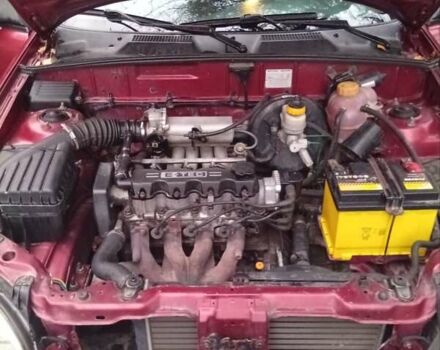 Красный Дэу Ланос, объемом двигателя 1.5 л и пробегом 174 тыс. км за 1750 $, фото 5 на Automoto.ua