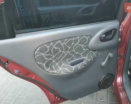 Красный Дэу Ланос, объемом двигателя 1.5 л и пробегом 275 тыс. км за 3300 $, фото 20 на Automoto.ua