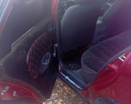 Красный Дэу Ланос, объемом двигателя 1.5 л и пробегом 174 тыс. км за 1700 $, фото 3 на Automoto.ua