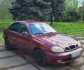 Красный Дэу Ланос, объемом двигателя 1.5 л и пробегом 283 тыс. км за 2800 $, фото 1 на Automoto.ua