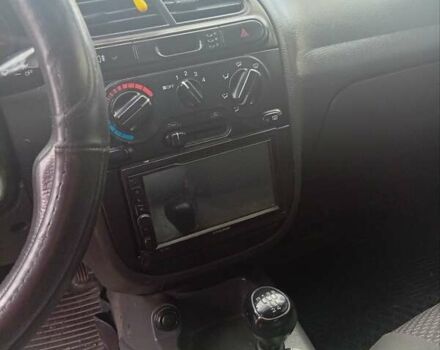 Красный Дэу Ланос, объемом двигателя 1.5 л и пробегом 174 тыс. км за 1550 $, фото 7 на Automoto.ua