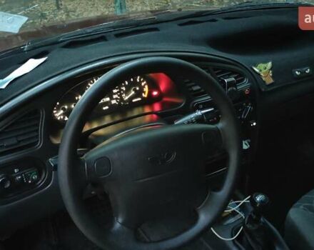 Красный Дэу Ланос, объемом двигателя 1.5 л и пробегом 275 тыс. км за 3300 $, фото 29 на Automoto.ua