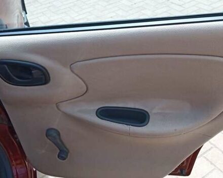 Дэу Ланос 2003 в Хмельницком на Automoto.ua Красный Дэу Ланос, объемом двигателя 2 л и пробегом 250 тыс. км за 1999 $, фото 10 на Automoto.ua