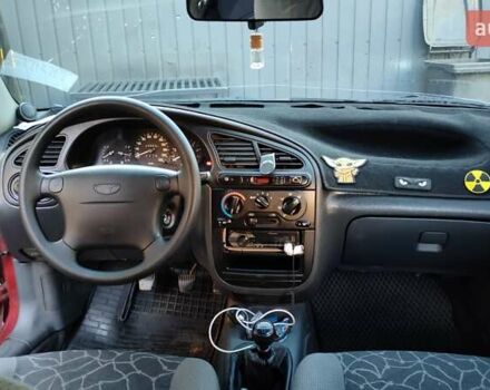 Красный Дэу Ланос, объемом двигателя 1.5 л и пробегом 275 тыс. км за 3300 $, фото 10 на Automoto.ua