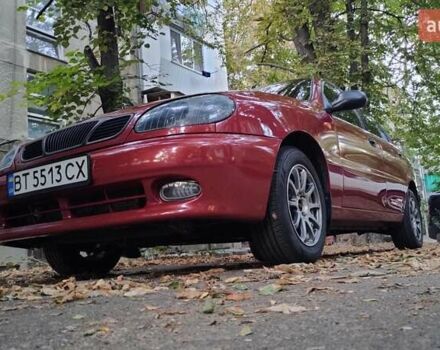 Красный Дэу Ланос, объемом двигателя 1.5 л и пробегом 275 тыс. км за 3300 $, фото 8 на Automoto.ua