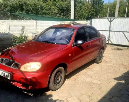 Красный Дэу Ланос, объемом двигателя 1.5 л и пробегом 203 тыс. км за 1650 $, фото 2 на Automoto.ua