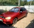 Красный Дэу Ланос, объемом двигателя 1.5 л и пробегом 203 тыс. км за 1650 $, фото 2 на Automoto.ua
