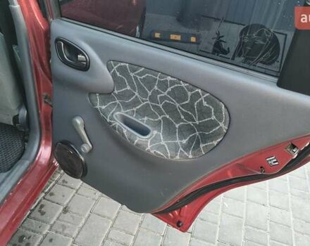 Красный Дэу Ланос, объемом двигателя 1.5 л и пробегом 275 тыс. км за 3300 $, фото 19 на Automoto.ua