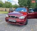 Красный Дэу Ланос, объемом двигателя 1.5 л и пробегом 203 тыс. км за 2550 $, фото 1 на Automoto.ua