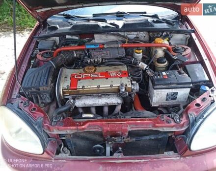 Дэу Ланос 2003 в Хмельницком на Automoto.ua Красный Дэу Ланос, объемом двигателя 2 л и пробегом 250 тыс. км за 1999 $, фото 13 на Automoto.ua