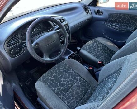 Червоний Деу Ланос, об'ємом двигуна 1.6 л та пробігом 277 тис. км за 1750 $, фото 18 на Automoto.ua