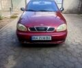 Красный Дэу Ланос, объемом двигателя 1.5 л и пробегом 203 тыс. км за 1650 $, фото 1 на Automoto.ua