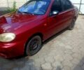 Красный Дэу Ланос, объемом двигателя 1.5 л и пробегом 203 тыс. км за 1650 $, фото 1 на Automoto.ua