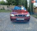 Красный Дэу Ланос, объемом двигателя 1.5 л и пробегом 203 тыс. км за 2550 $, фото 1 на Automoto.ua