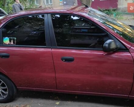 Красный Дэу Ланос, объемом двигателя 1.5 л и пробегом 275 тыс. км за 3300 $, фото 5 на Automoto.ua