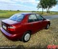 Красный Дэу Ланос, объемом двигателя 1.5 л и пробегом 213 тыс. км за 2599 $, фото 3 на Automoto.ua
