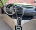 Красный Дэу Ланос, объемом двигателя 1.5 л и пробегом 203 тыс. км за 2550 $, фото 11 на Automoto.ua