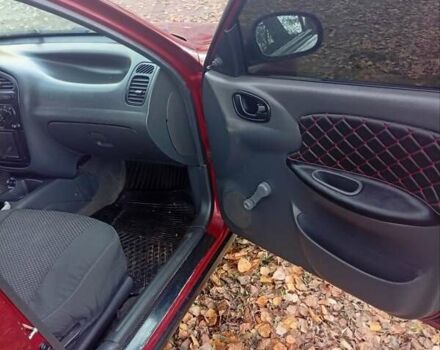 Красный Дэу Ланос, объемом двигателя 1.5 л и пробегом 174 тыс. км за 1700 $, фото 6 на Automoto.ua