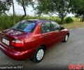 Красный Дэу Ланос, объемом двигателя 1.5 л и пробегом 213 тыс. км за 2599 $, фото 6 на Automoto.ua