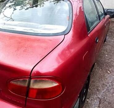 Красный Дэу Ланос, объемом двигателя 1.5 л и пробегом 150 тыс. км за 1000 $, фото 3 на Automoto.ua