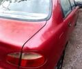 Красный Дэу Ланос, объемом двигателя 1.5 л и пробегом 150 тыс. км за 1000 $, фото 3 на Automoto.ua