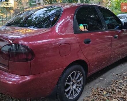 Красный Дэу Ланос, объемом двигателя 1.5 л и пробегом 275 тыс. км за 3300 $, фото 4 на Automoto.ua