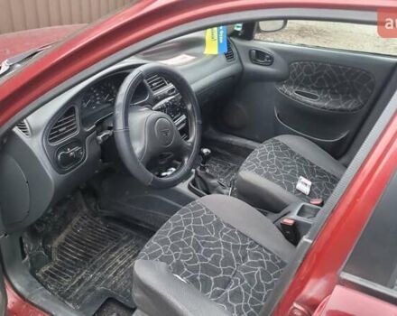 Красный Дэу Ланос, объемом двигателя 1.5 л и пробегом 283 тыс. км за 2800 $, фото 5 на Automoto.ua