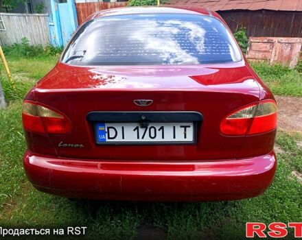 Деу Ланос 2004 у Мерефа на Automoto.ua Червоний Деу Ланос, об'ємом двигуна 1.5 л та пробігом 400 тис. км за 2200 $, фото 1 на Automoto.ua